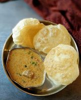 Bhatura with Meka Mamsam