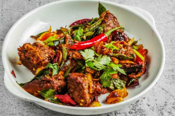 Mutton Sukka Varuval (Boneless Goat)