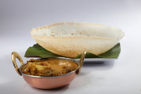 AAPPAM WITH GOAT CURRY 