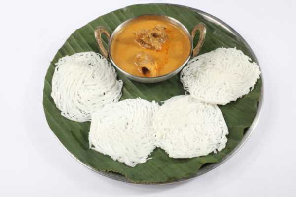 IDIYAPPAM WITH GOAT CURRY