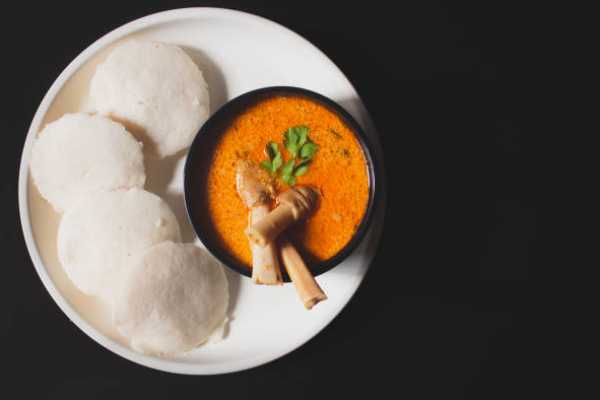 Two Idly with Goat Curry
