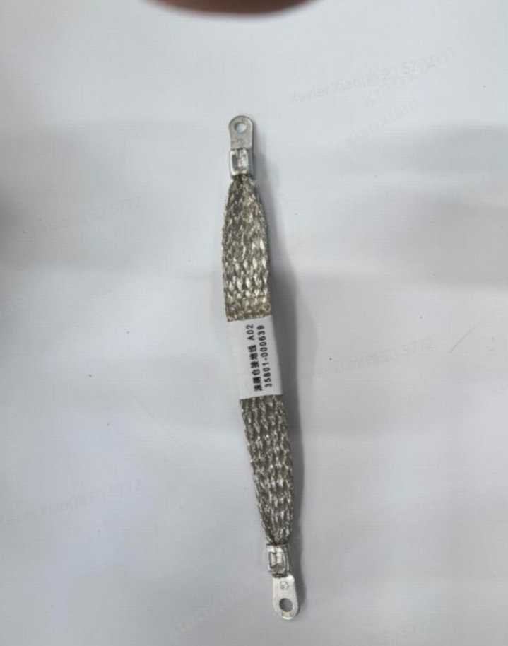 Roller brush chamber grounding wire