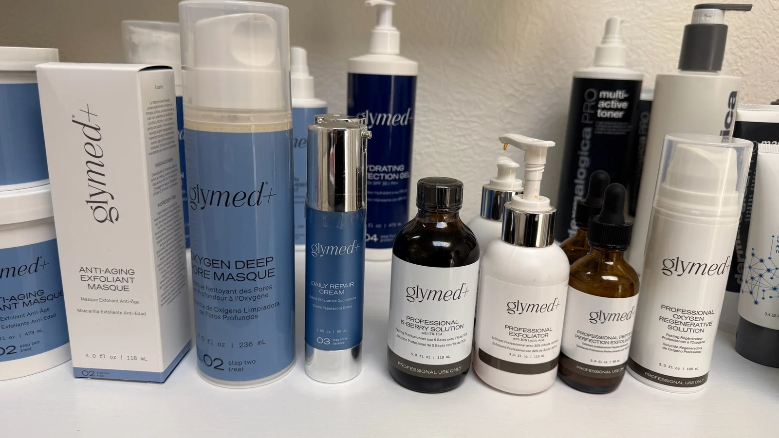 Professional skincare shelf with Glymed and Dermalogica products